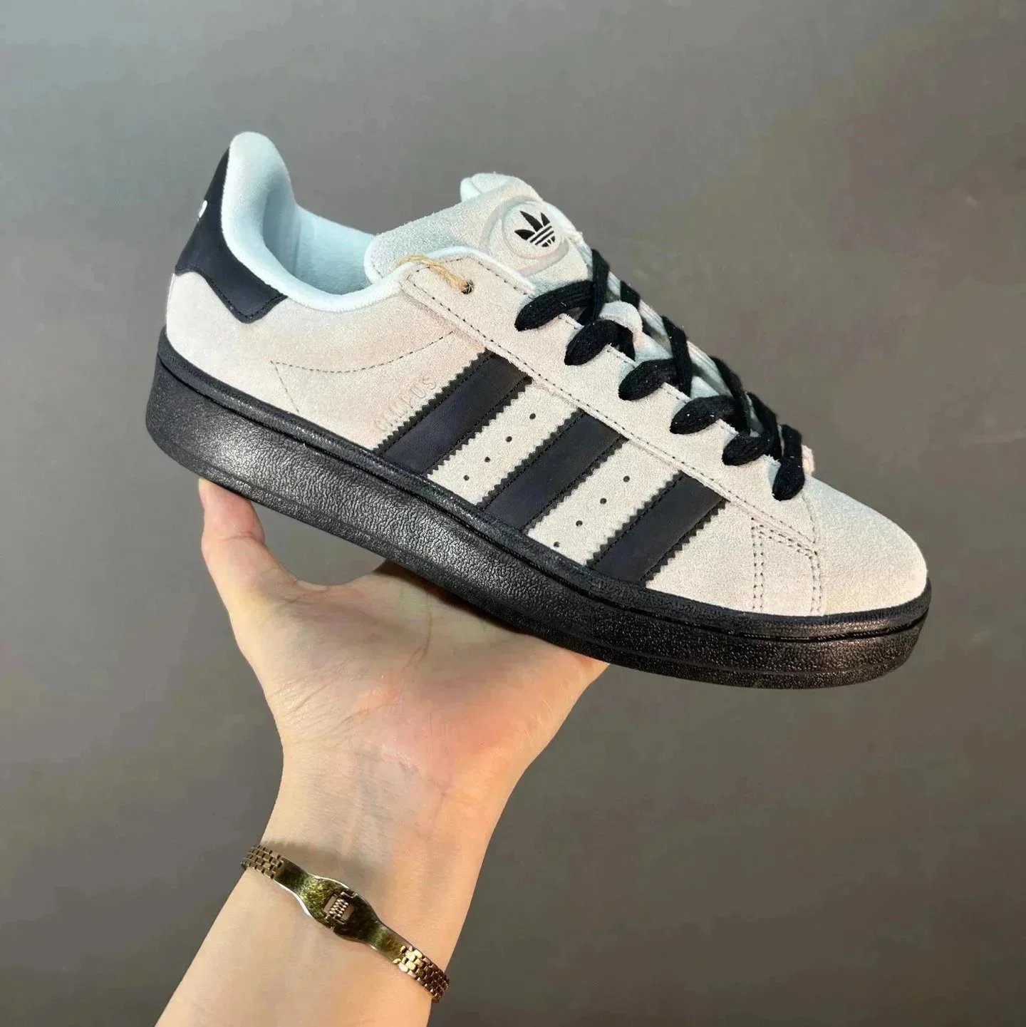 Off-white, gray, and black
